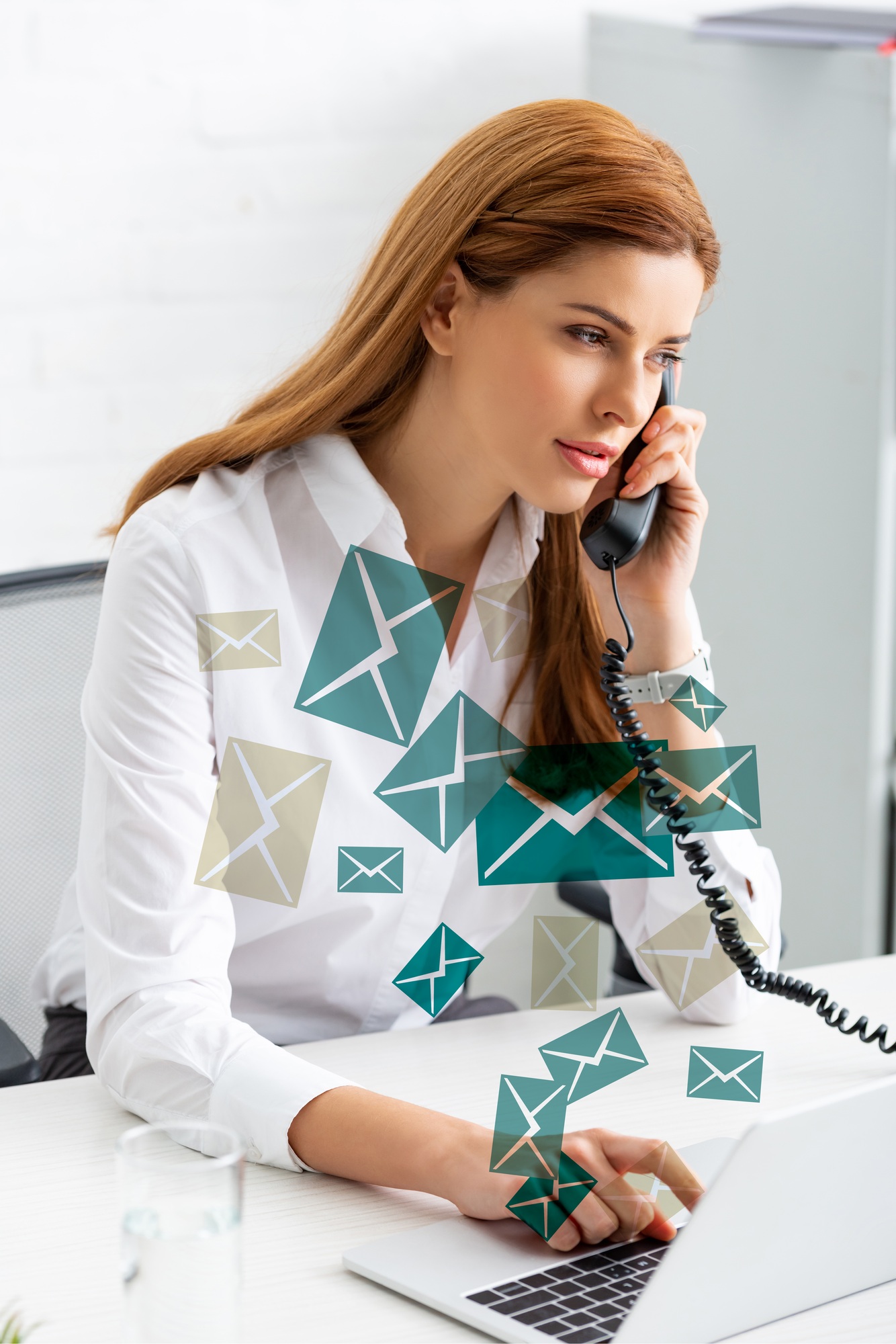 Successful businesswoman using laptop and talking on phone at office table, e-mail illustration